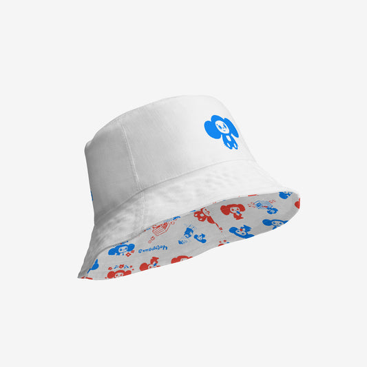 A white reversable bucket hat with a Soviet cartoon character Cheburashka pattern in red and blue. Front side 2, 3D view.