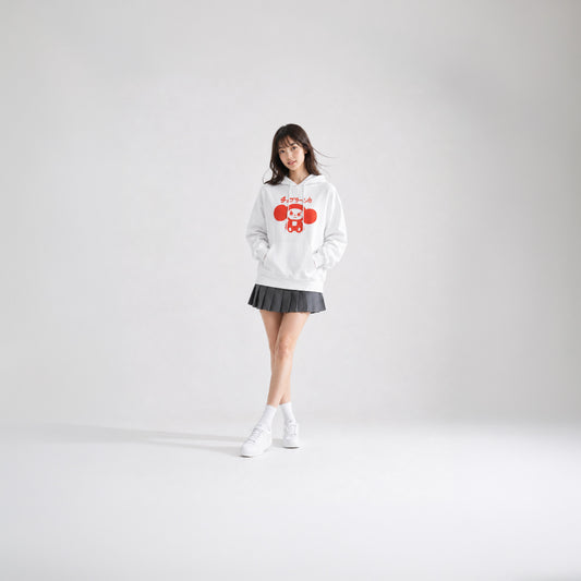 Japanese girl model wearing skirt and white unisex hoodie with minimalist graphic of original smiley Soviet cartoon character Cheburashka and チェブラーシカ logo in red.