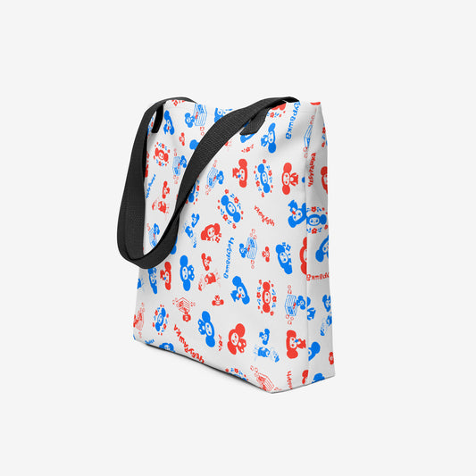 A white tote bag with a black shoulder strap, featuring an all-over pattern of red and blue original Soviet cartoon characters Cheburashka. Side photo.