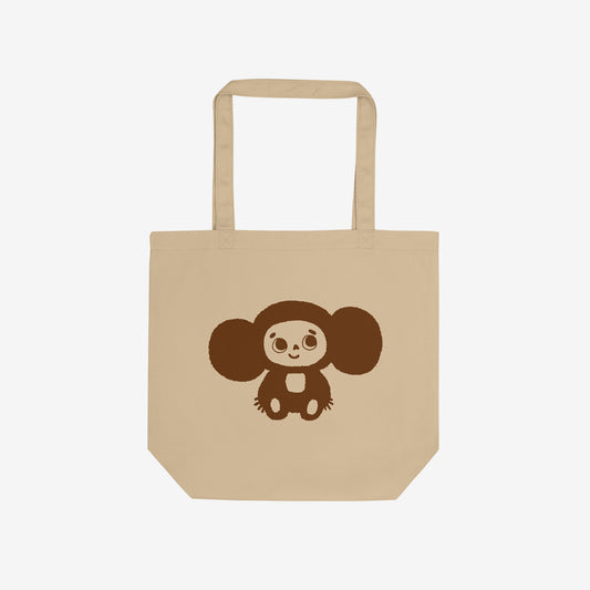 Eco tote bag with original Soviet cartoon character smiley minimalist Cheburashka on one side and Чебурашка logo on the other side. Front.