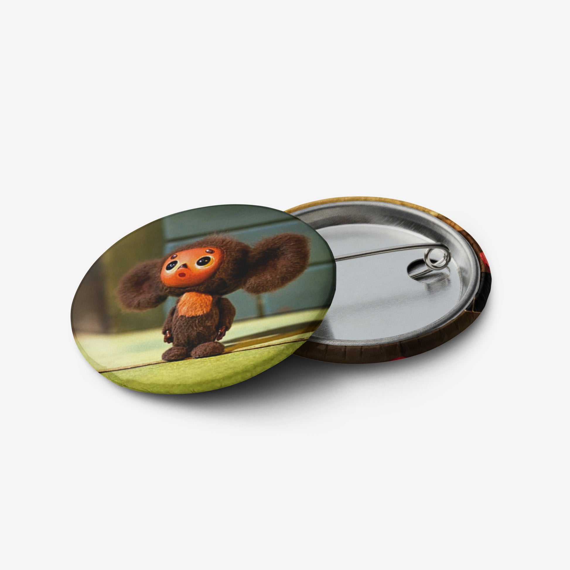 A pin with Soviet cartoon character Cheburashka.