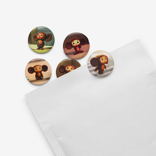 A letter with a set of 5 pins with Soviet cartoon character Cheburashka.
