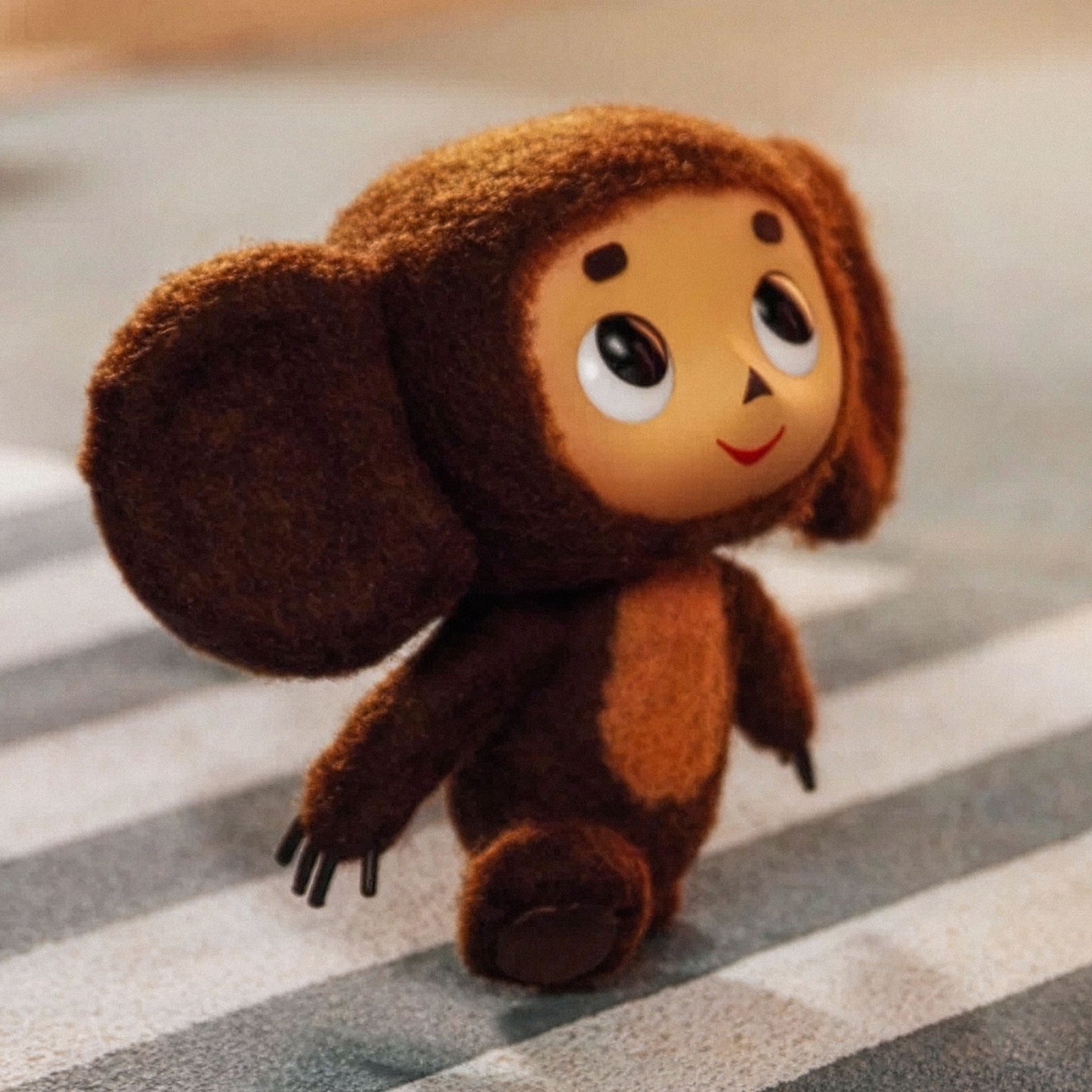 Large 91x61cm poster with Cheburashka on road zebra crossing. Still frame from old original Soviet cartoon. With logo Чебурашка. Closeup.