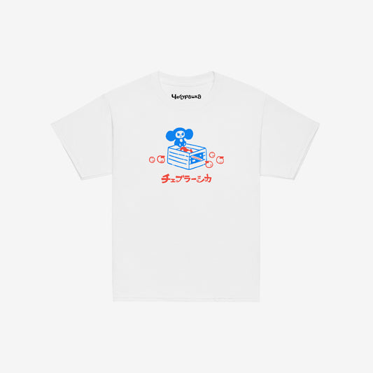 White unisex youth T-shirt with original Soviet cartoon character Cheburashka sitting on a box of oranges and チェブラーシカ logo in red. Front.