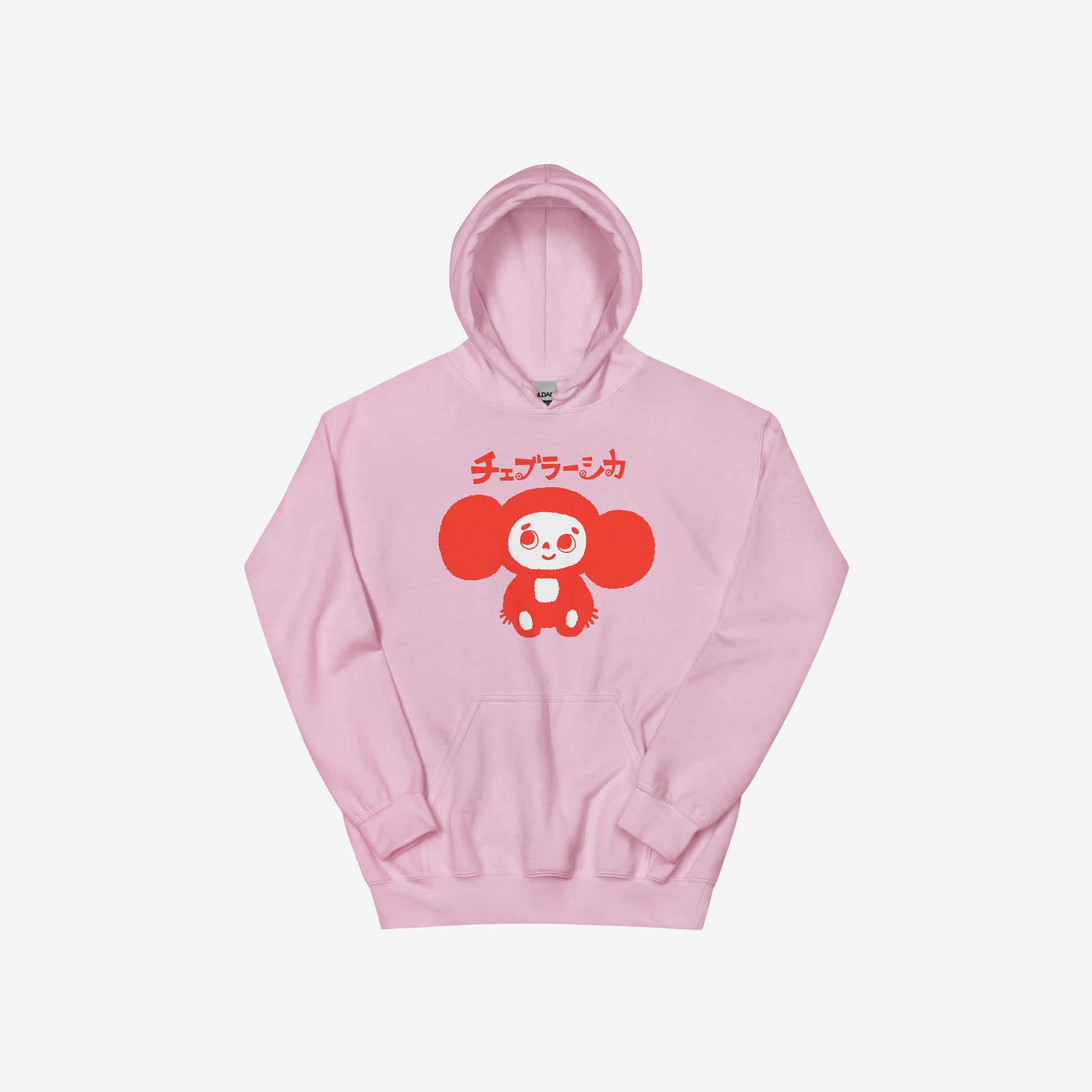 Light pink unisex hoodie with minimalist graphic of original smiley Soviet cartoon character Cheburashka and チェブラーシカ logo in red.