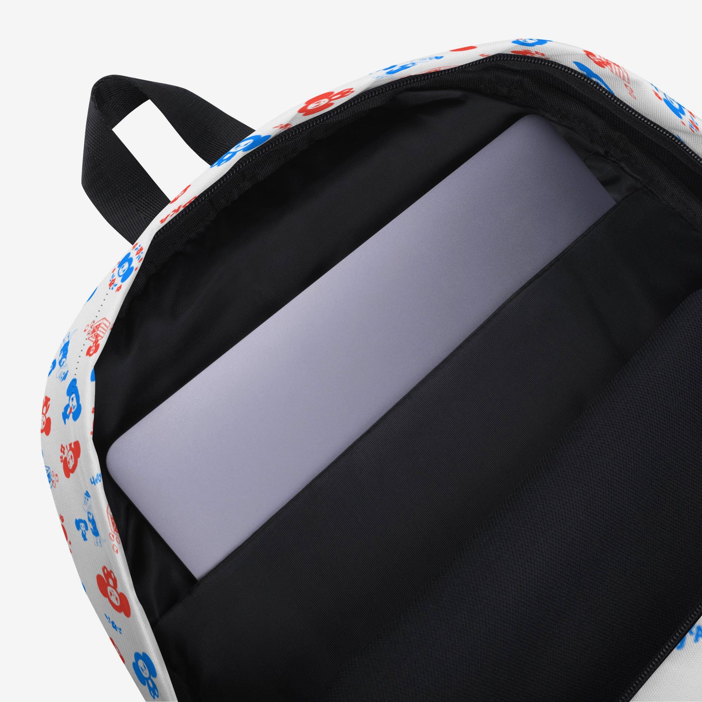 A white backpack with a front pocket, featuring all over print pattern of the Soviet cartoon character Cheburashka in blue and red. Inside laptop pocket.