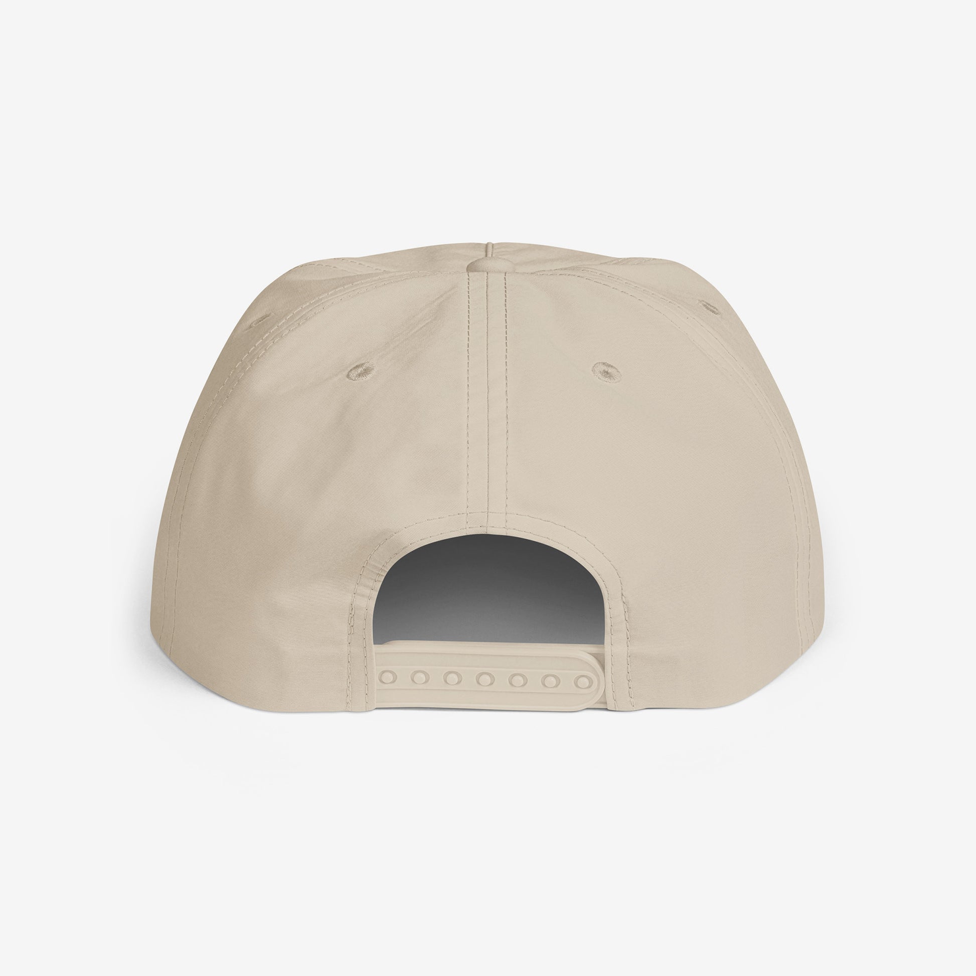 A beige surf cap with a flat brim, featuring brown Soviet cartoon character Cheburashka on the front. Back side.